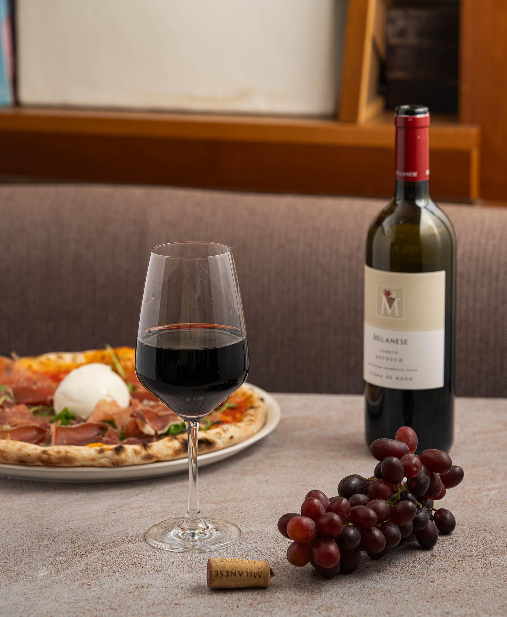 Red wine paired with Pizza Parma